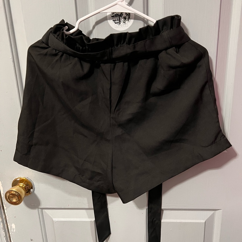 Black pair of shorts very flowly size small